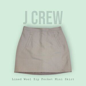 J. Crew Women's Gorgeous Wool Zip Pocket Mini Skirt. Back zipper closure. Lined.
